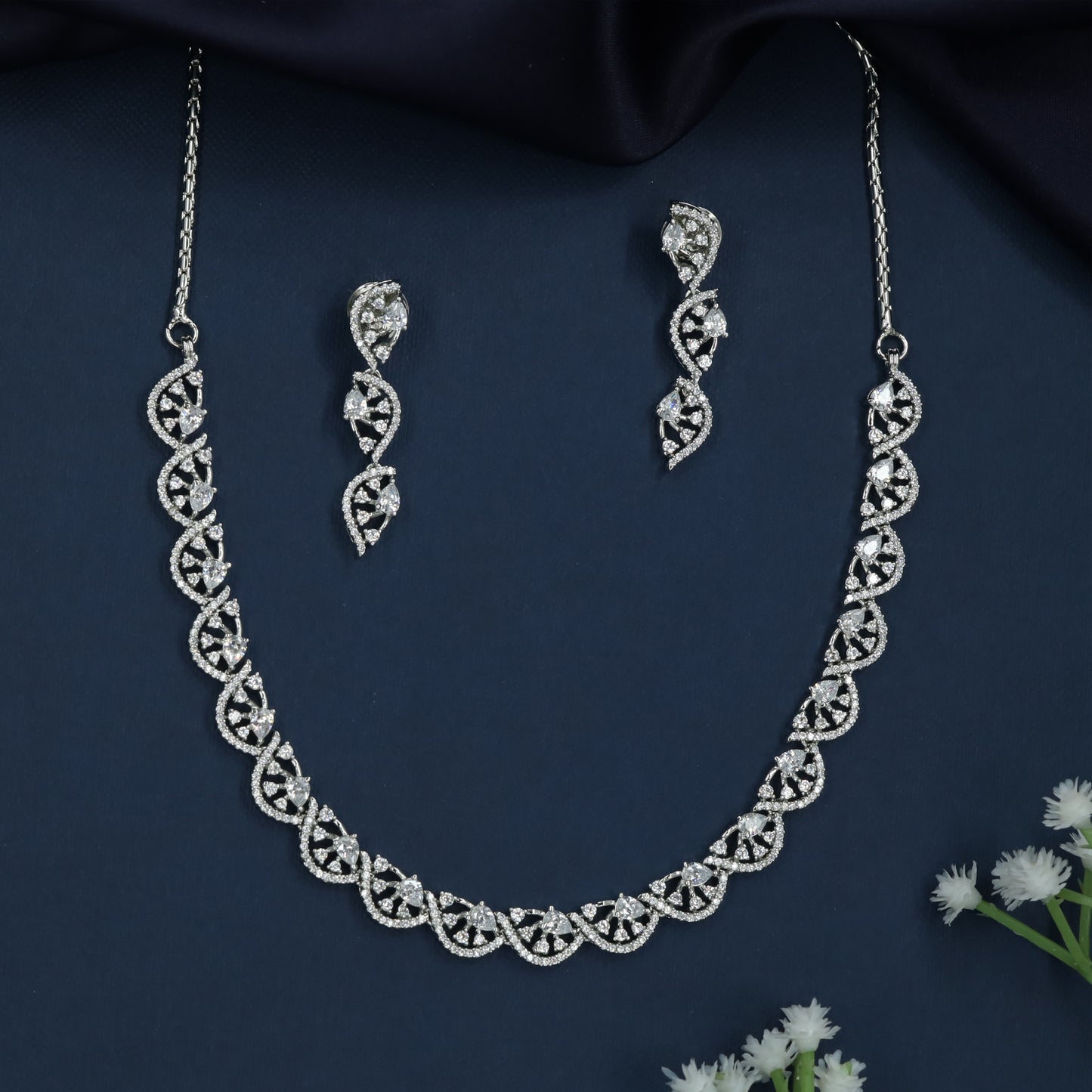 Moon Arc Rhodium Necklace with Decorative Spiral Formation