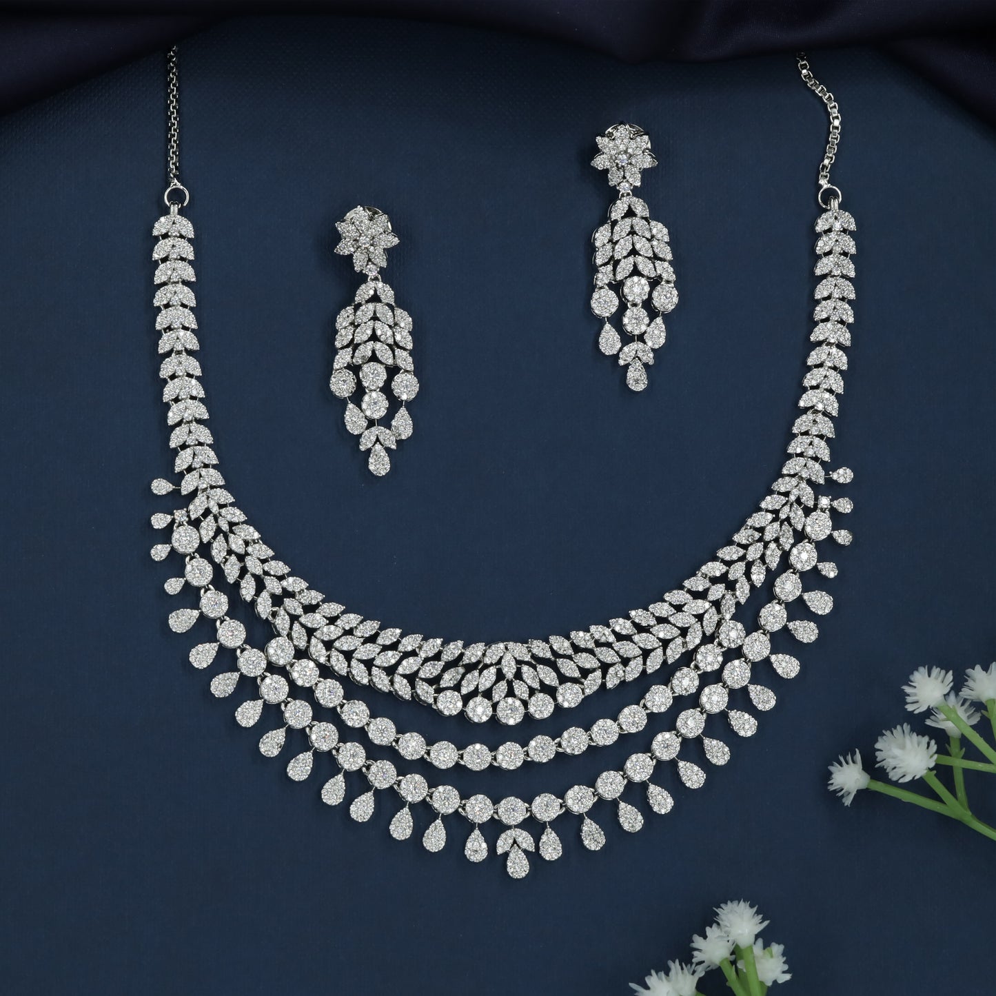 Radiant Garland Rhodium Necklace with Hanging Pear Styling