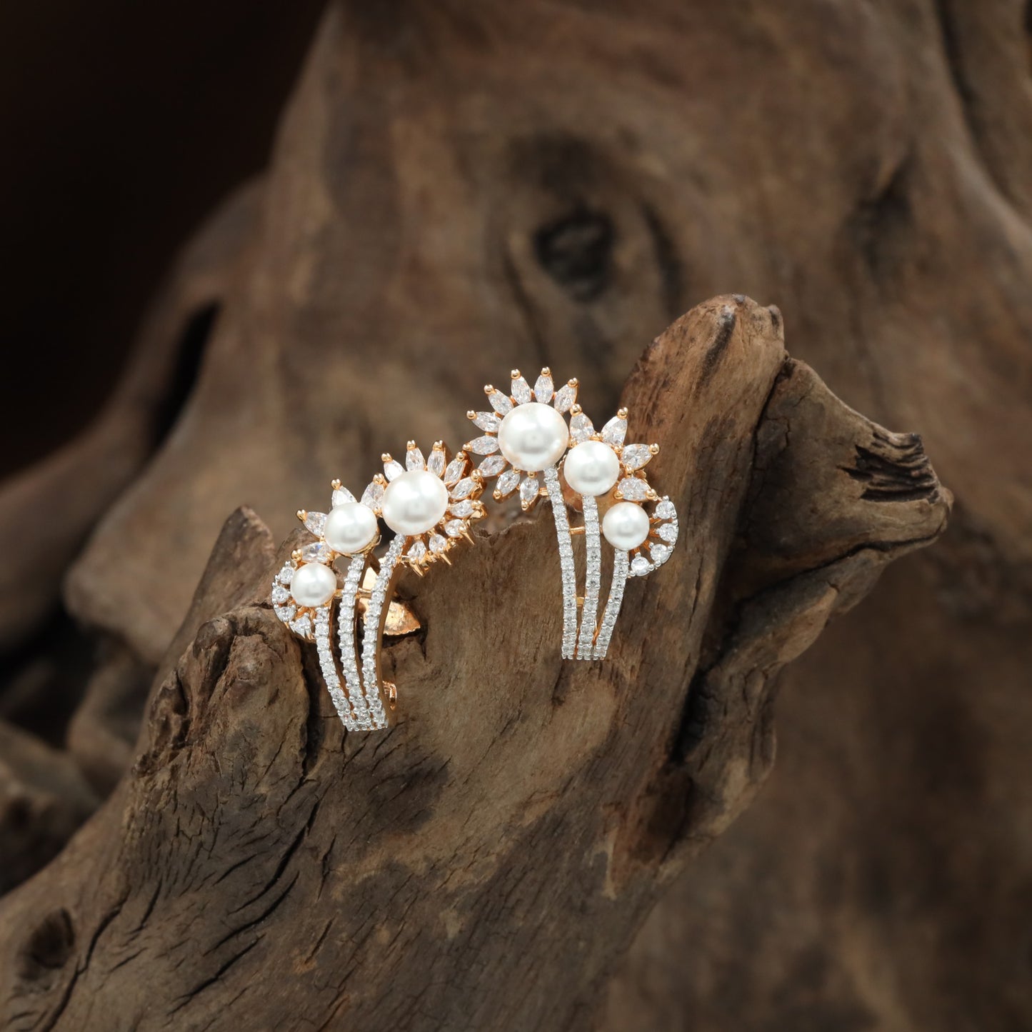 Monarch Floral Sweep Stud with Decorative Arc Placement