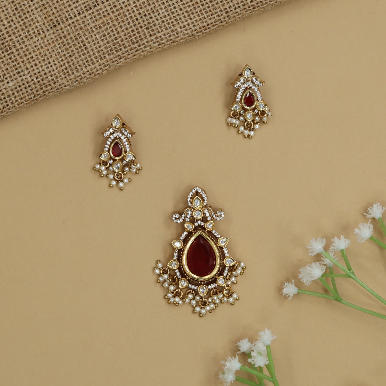Grand Bloom Pendant Set with Structured Pear Arrangement and Border Styling