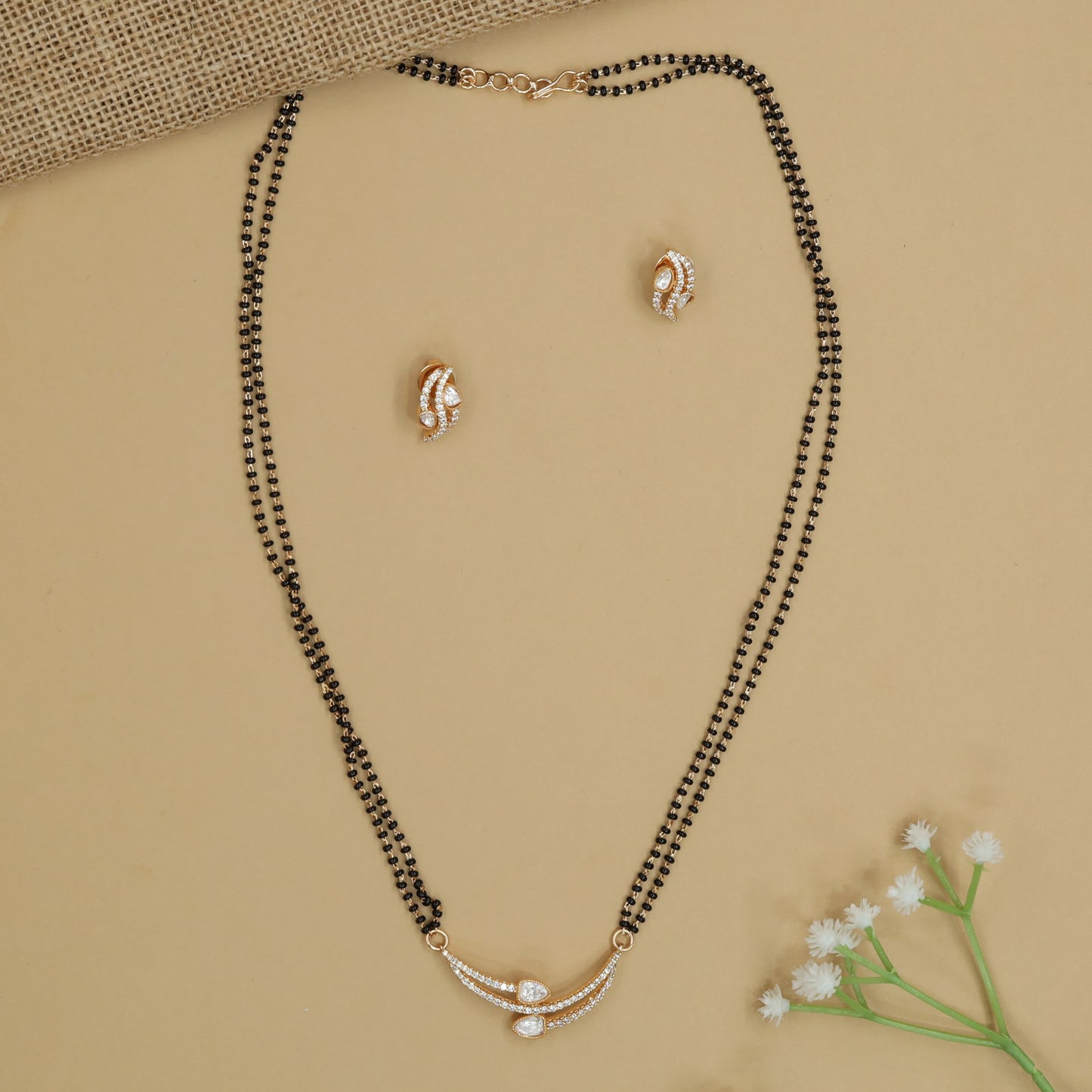 Ribbon Arc Gold Polish Mangalsutra with Hanging Oval Accent
