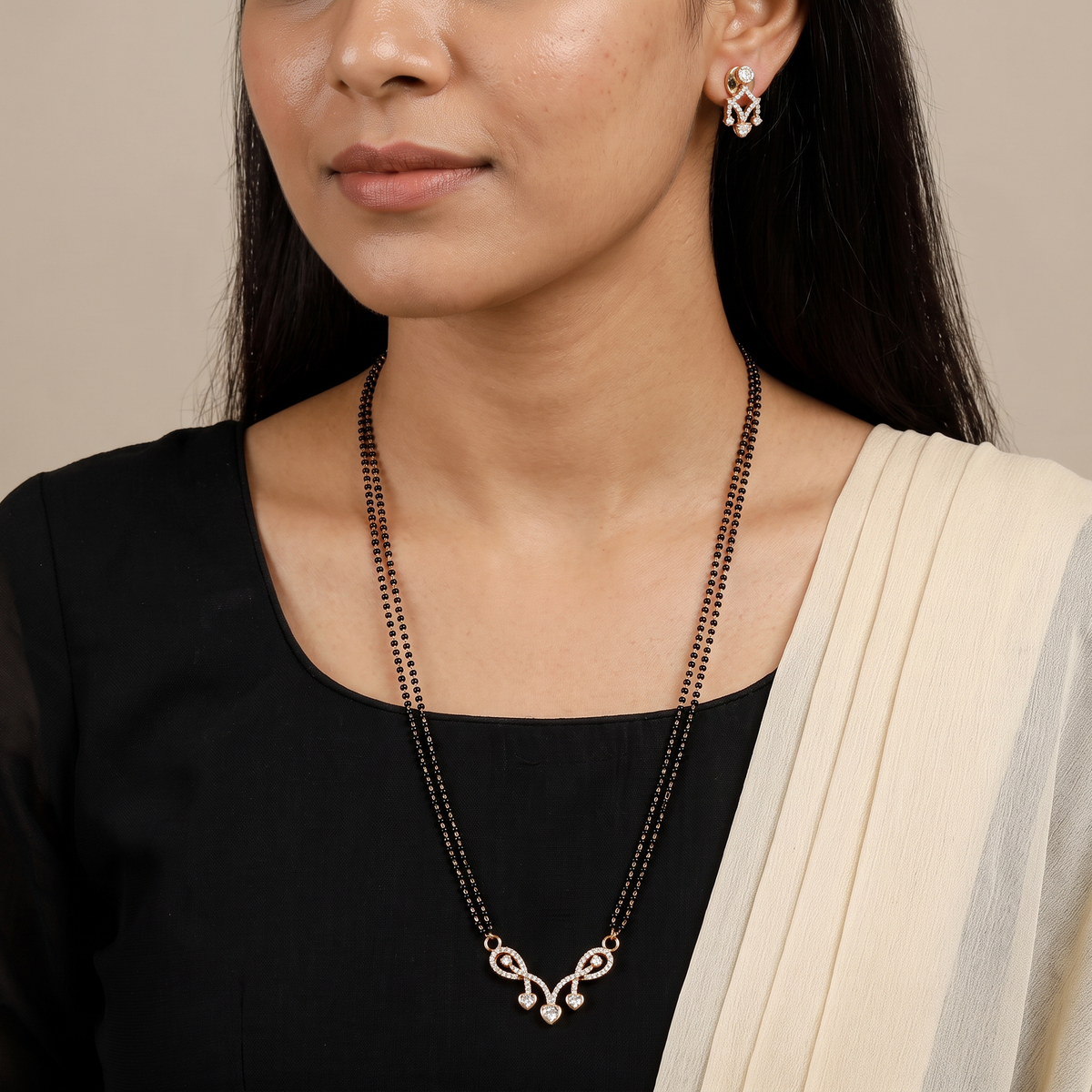 Twisted Loop Gold Polish Mangalsutra with Open Ribbon Pendant