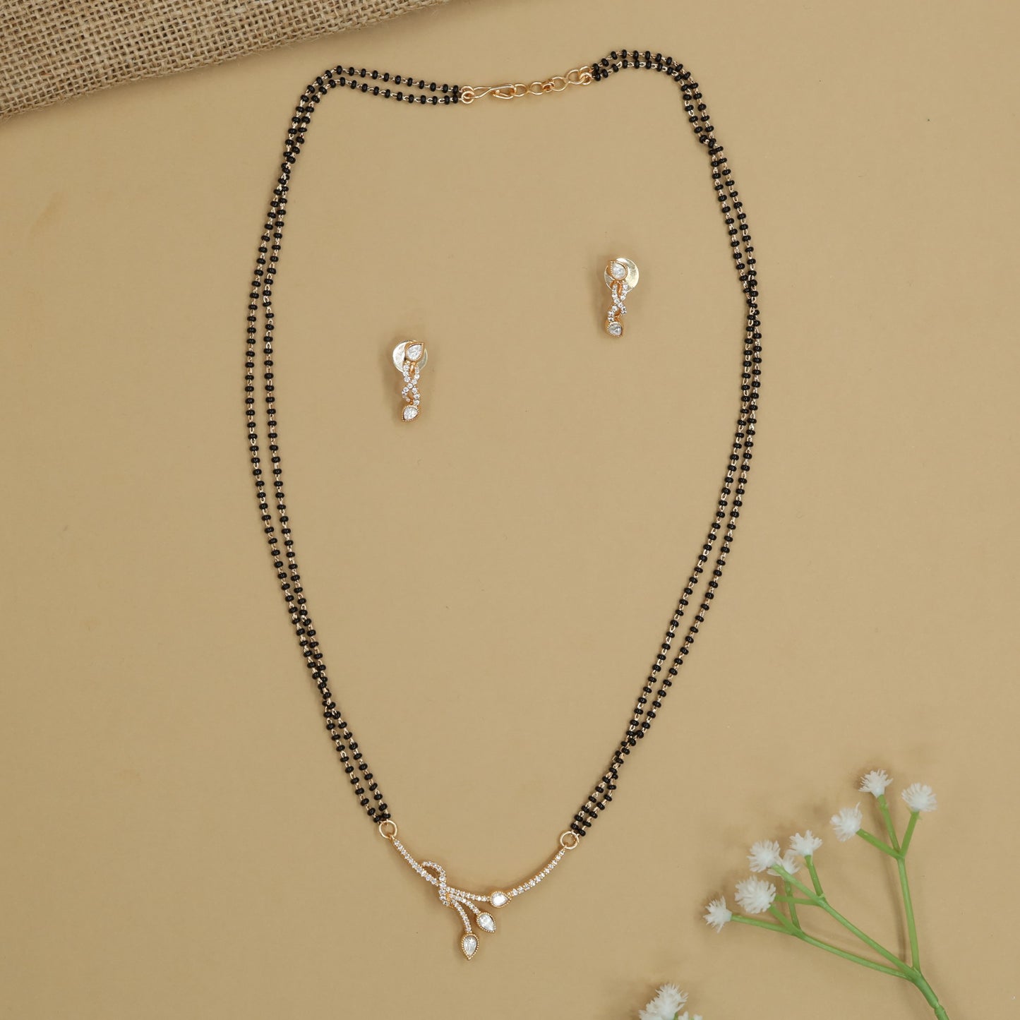 Leaf Drop Gold Polish Mangalsutra with Curved Ribbon Pendant