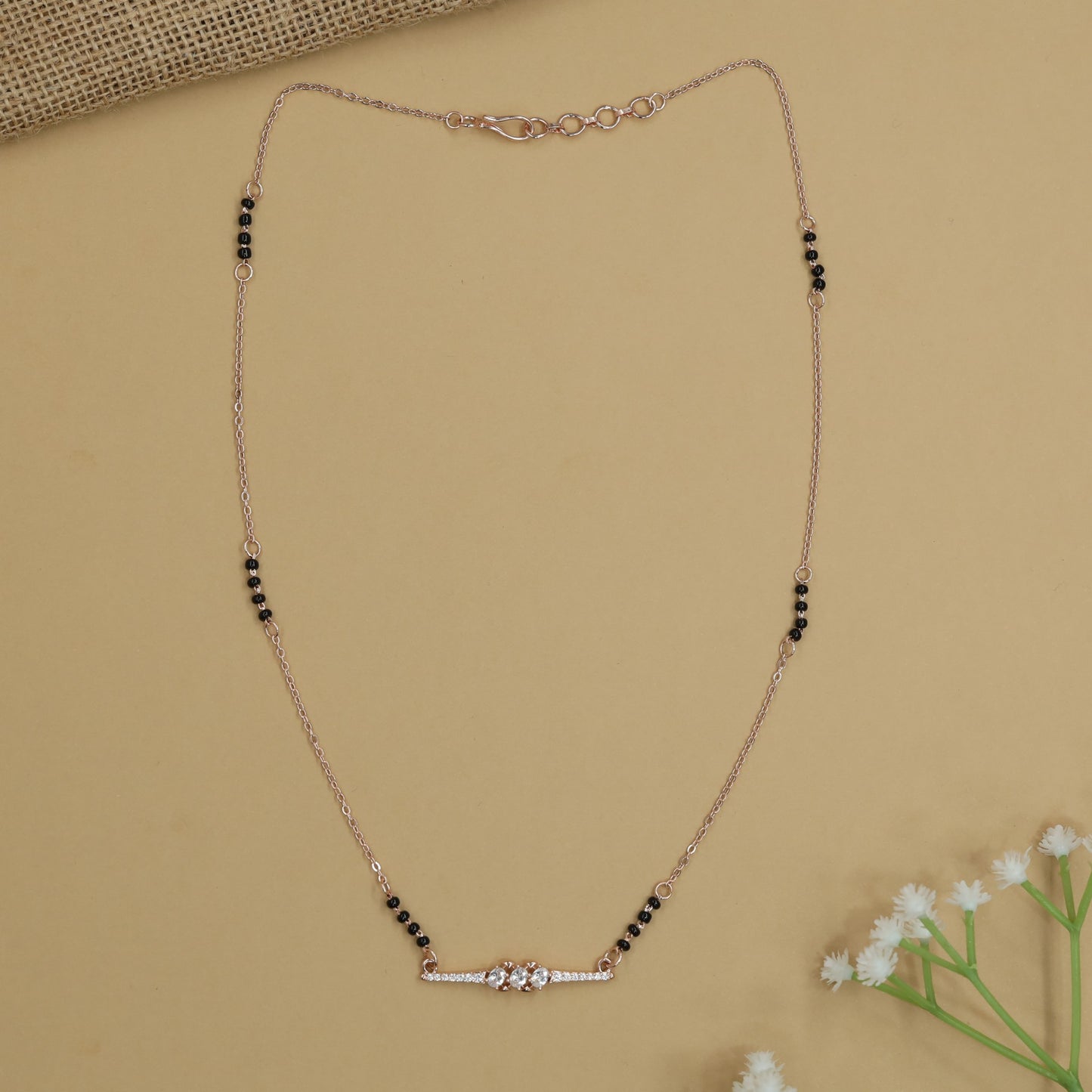 Delicate Exclusive Gold Polish Mangalsutra with Spaced Bead Clusters and Slim Centre Bar