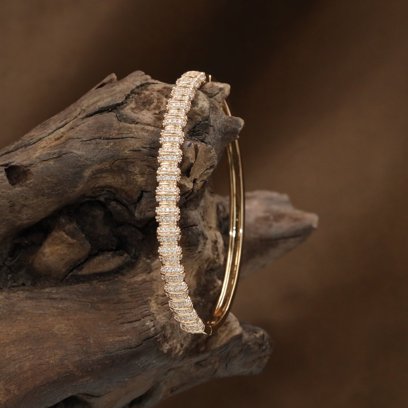 Bezel Band Kada with Continuous Frame Placement and Raised Styling