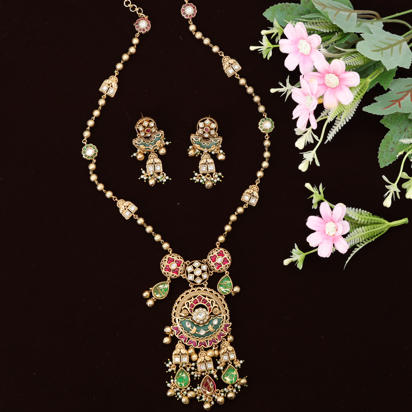 Elegant Long Haara Set with Decorative Circular Pendant Design