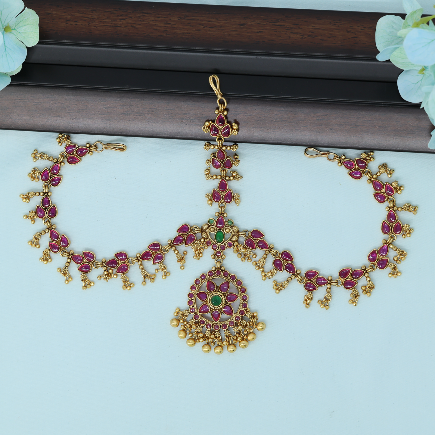 Radiant Floral Medallion Headset with Cascading Motif Chains and Pendant Drops