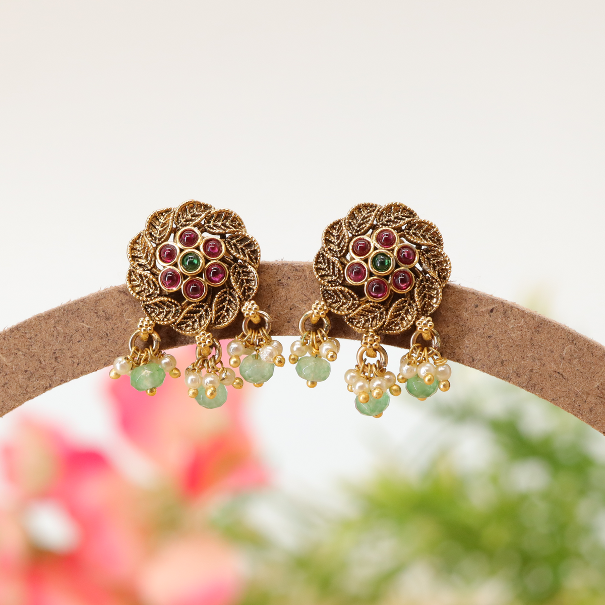 Navapushpa Leaf Medallion Stud with Clustered Stone Centre and Pearl Ball Tassels