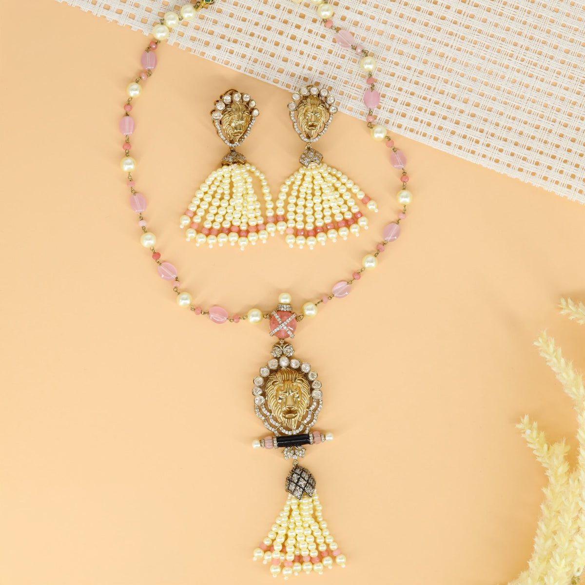 Beads long haara with an ornate lion face pendant
