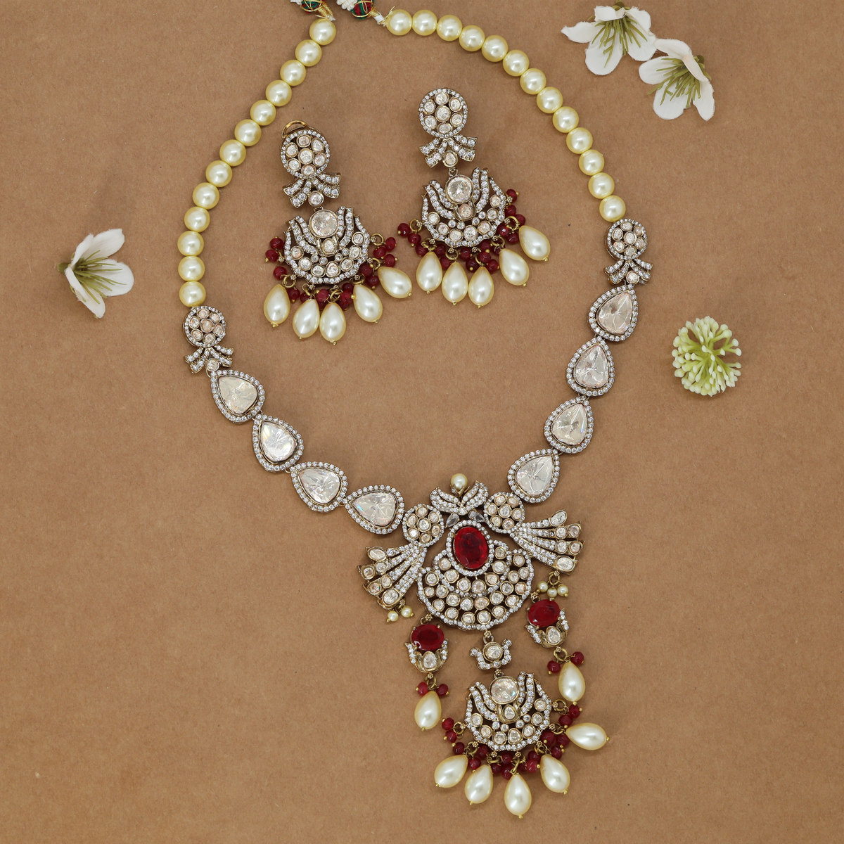Ornate Teardrop Link Necklace with Decorative Central Pendant and Dangling Elements