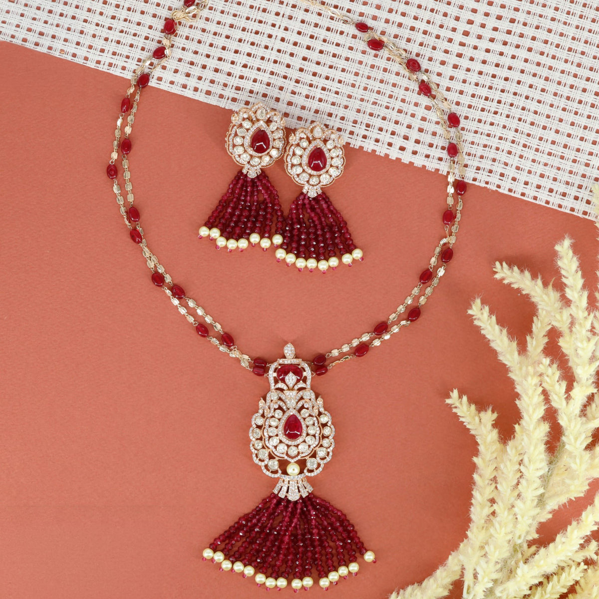 Victorian long haara featuring a double-strand chain and beaded drops