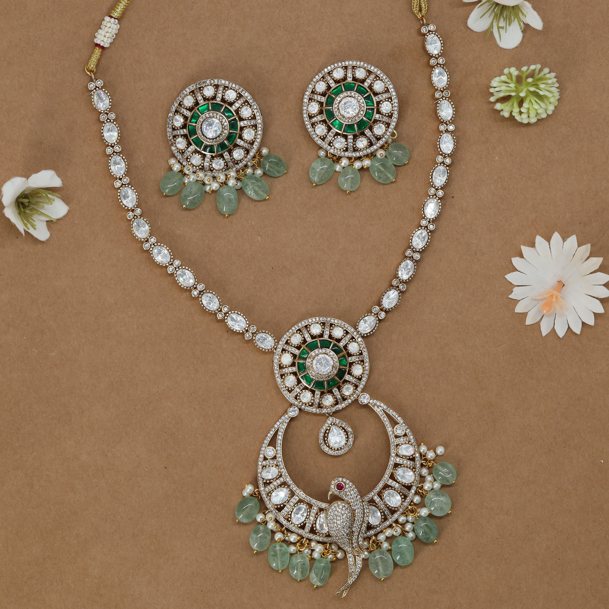 Circular Pendant Necklace with Bird Design and Pearl Drops