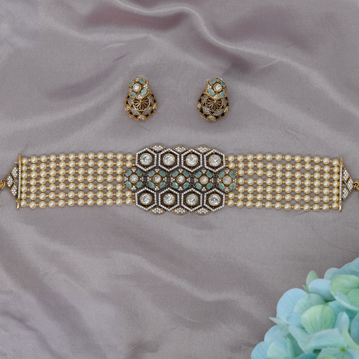Pearl strand Kundan Choker featuring a hexagonal stone arrangement