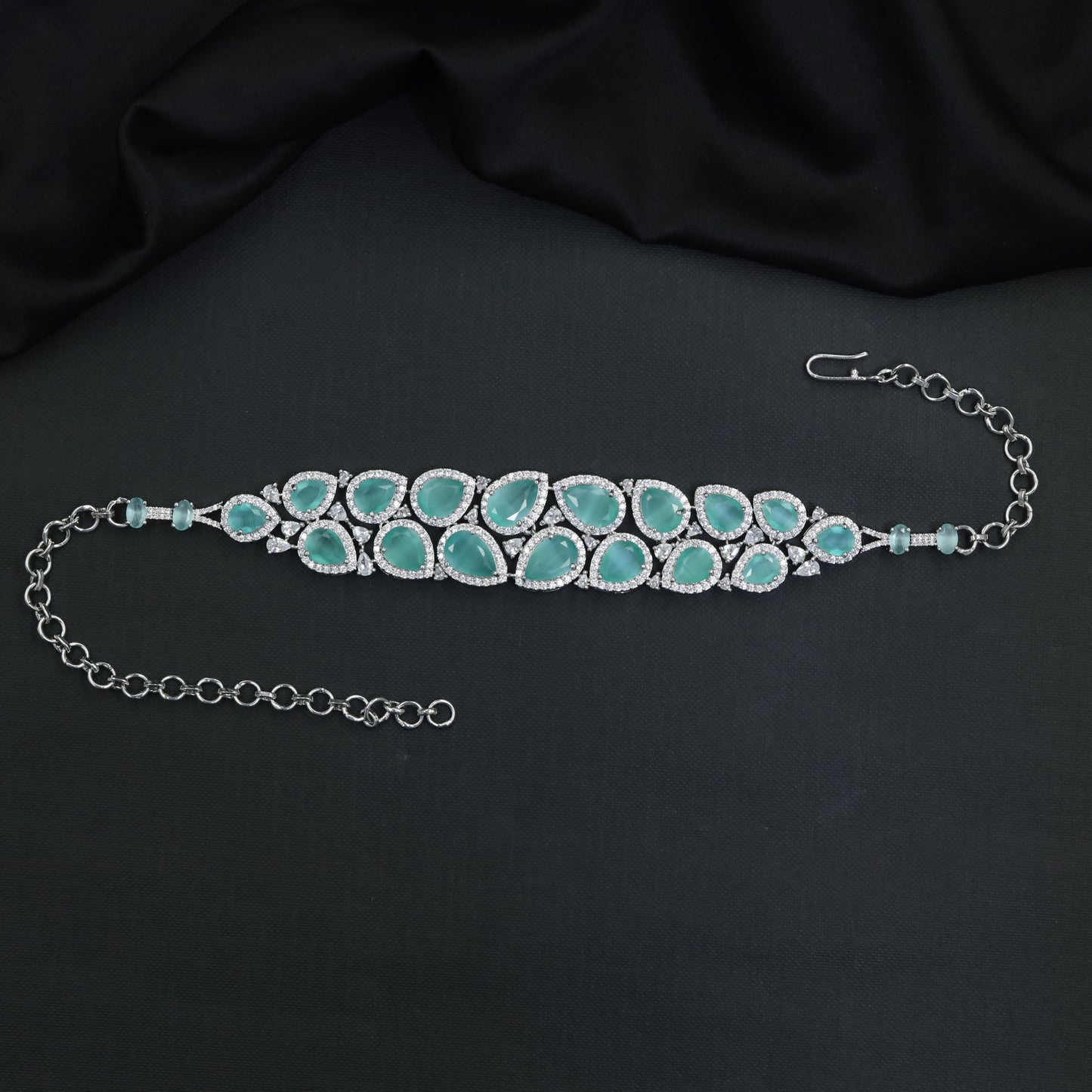 Grand teardrop Rhodium Choker with repeating framed elements and structured openwork