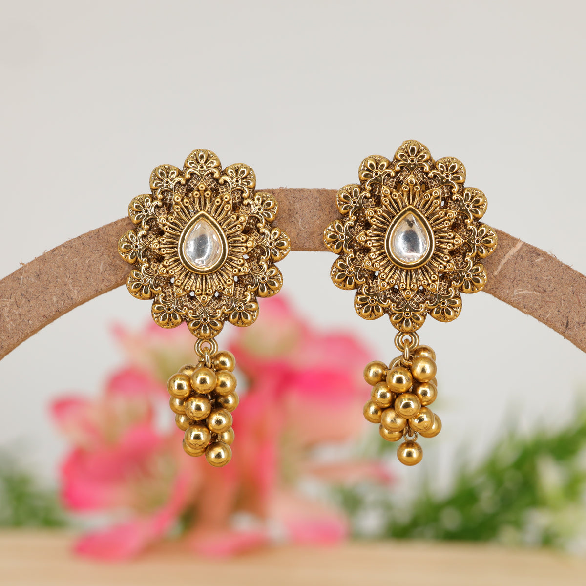 Radial Filigree Floral Hanging with Teardrop Centre