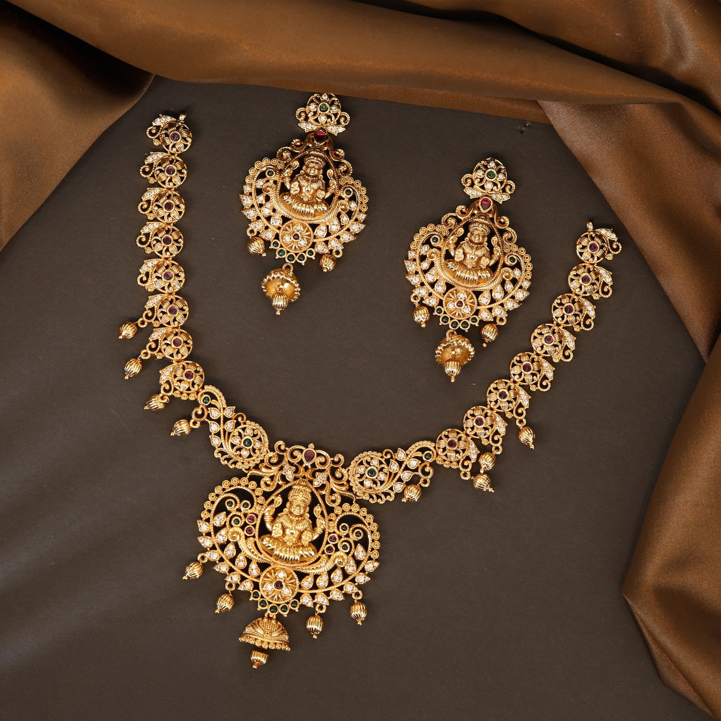 Classic Temple Necklace with Sculpted Lakshmi Pendant and Curved Chain Layout
