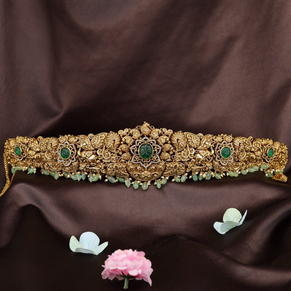 Signature antique waist belt with refined floral ornamentation