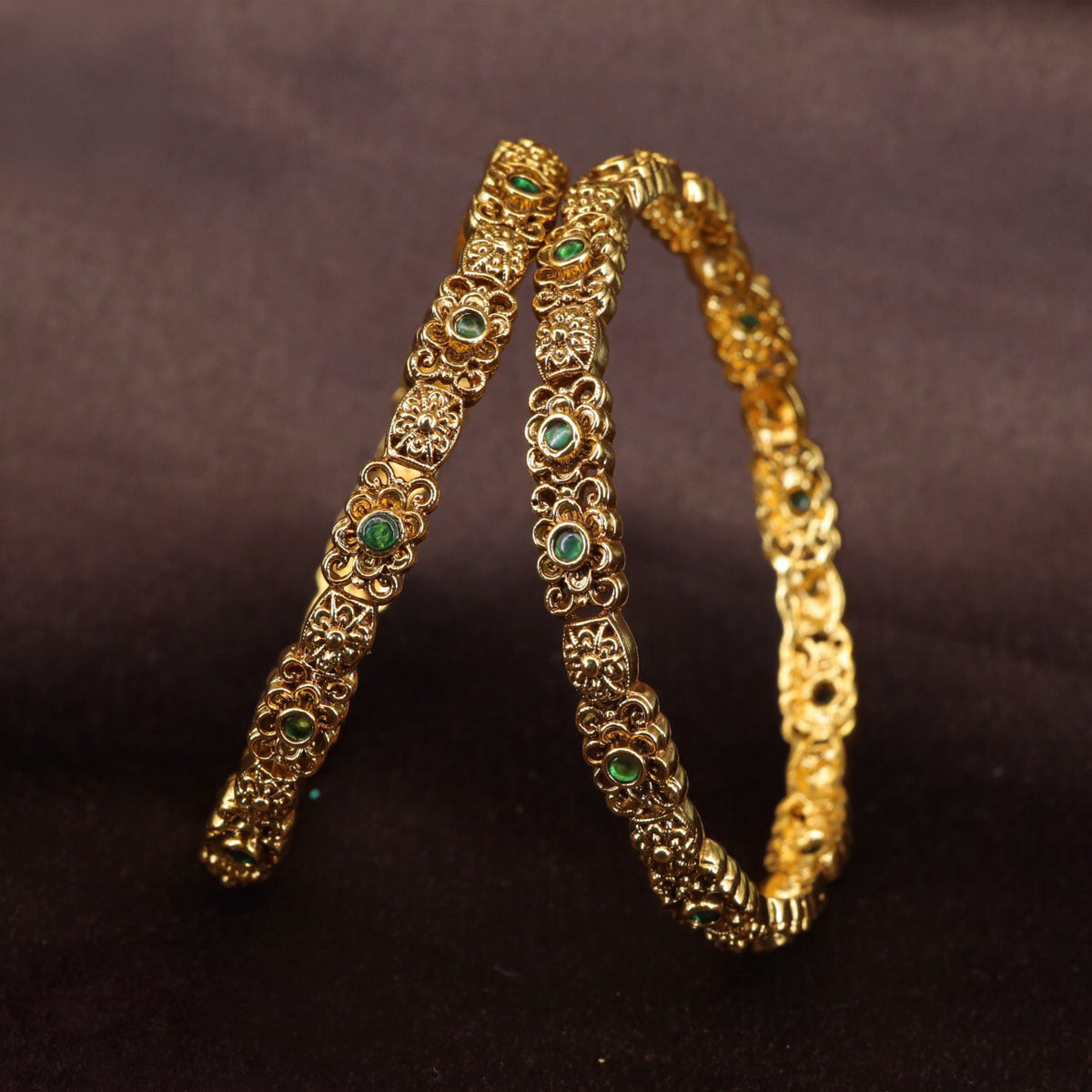 Traditional antique bangles with refined decorative panels