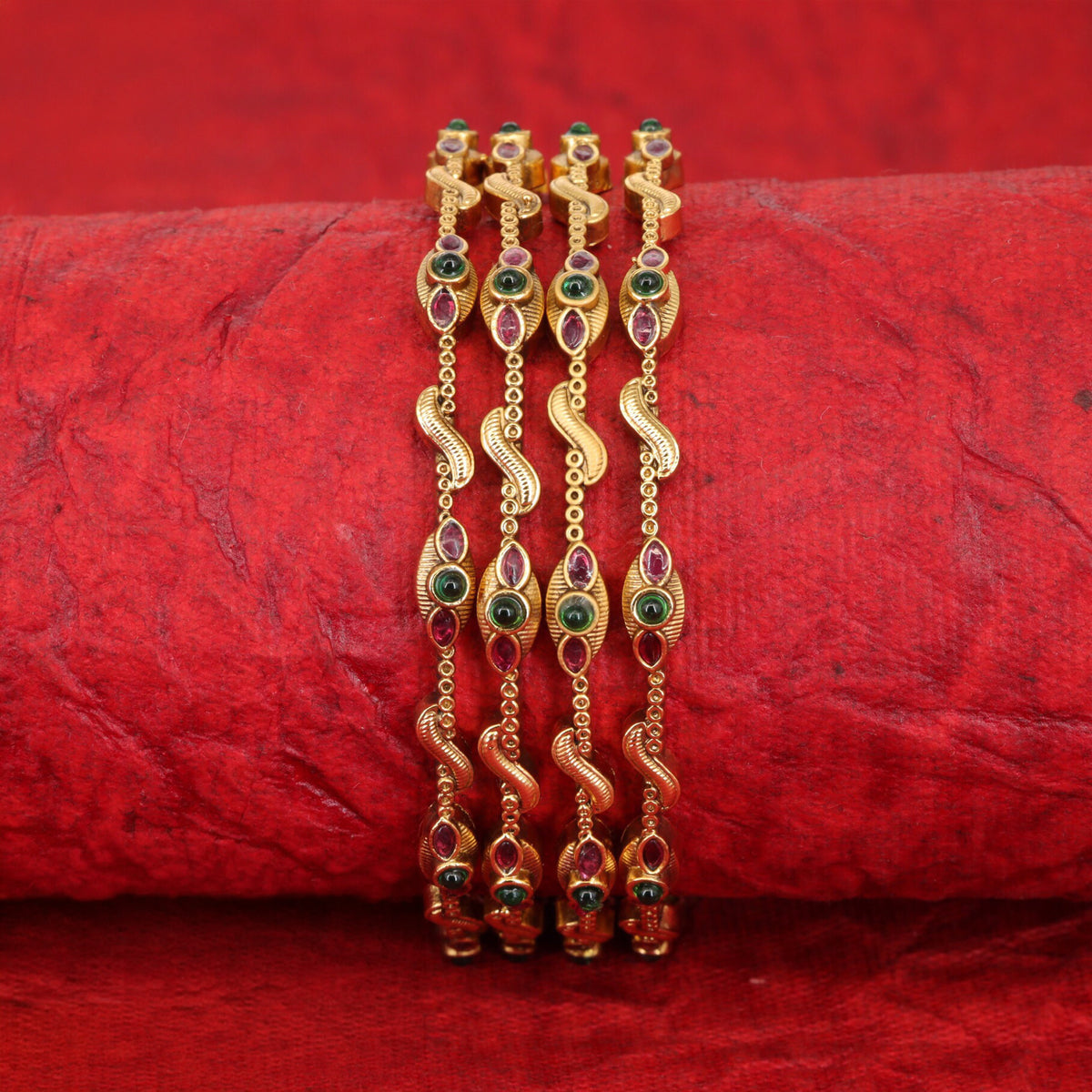 Vintage-inspired antique bangles with ornate curved detailing