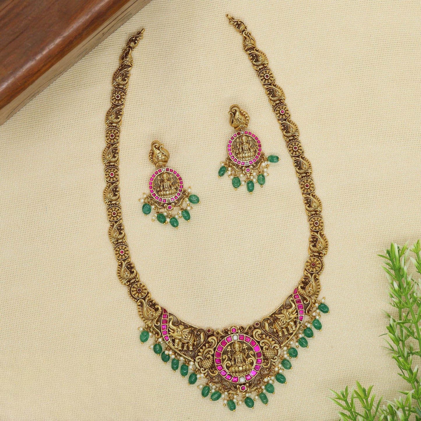 Heritage Style Long Haara with Lakshmi Coin Pendant and Detailed Elephant Motif Panels