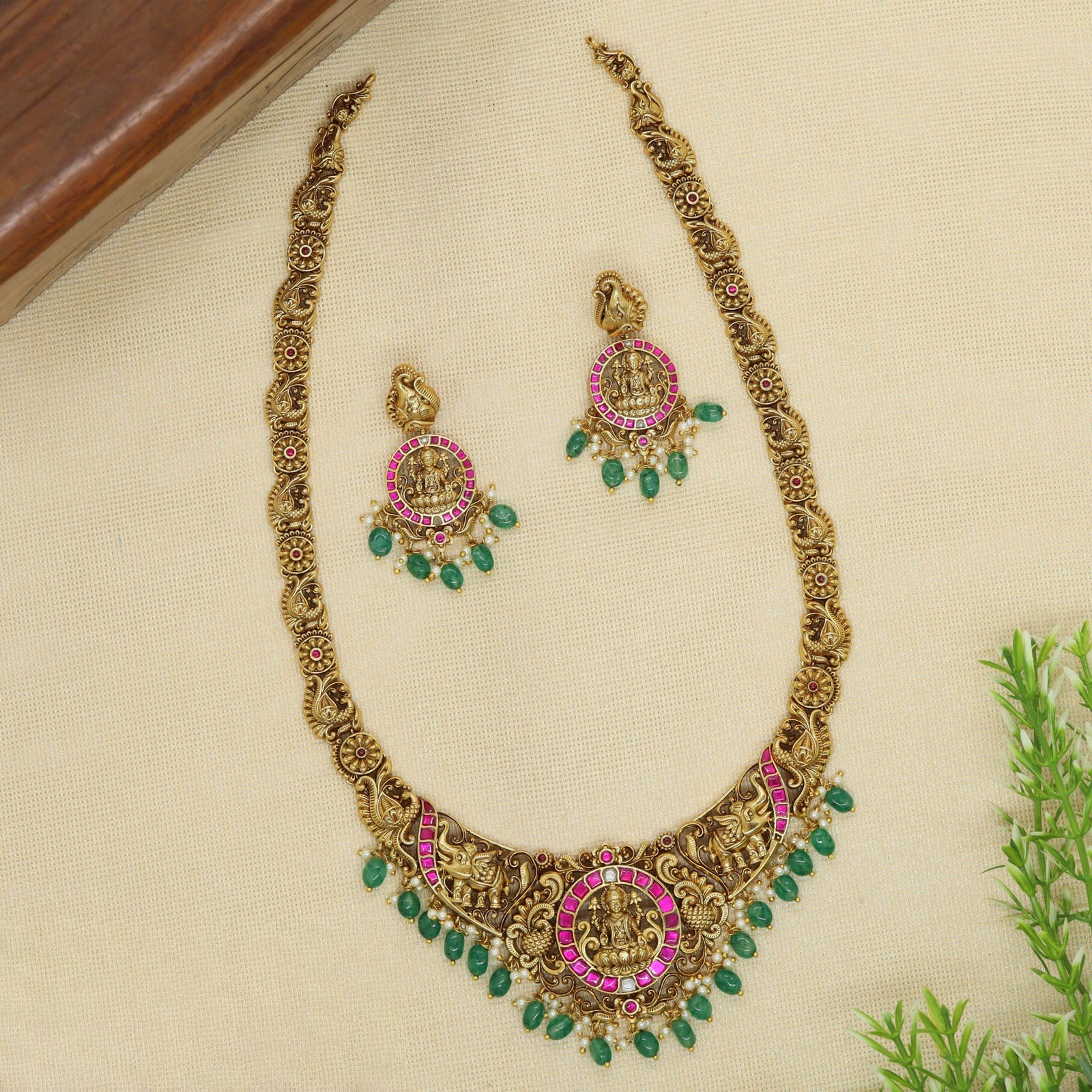 Heritage Style Long Haara with Lakshmi Coin Pendant and Detailed Elephant Motif Panels