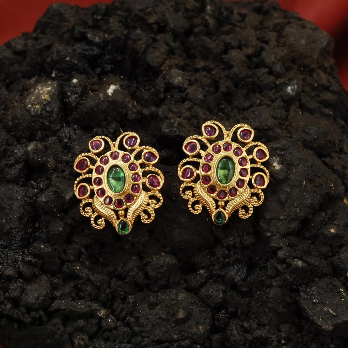 Detailed Medallion Stud Earrings with Oval Core and Surrounding Petal Formation