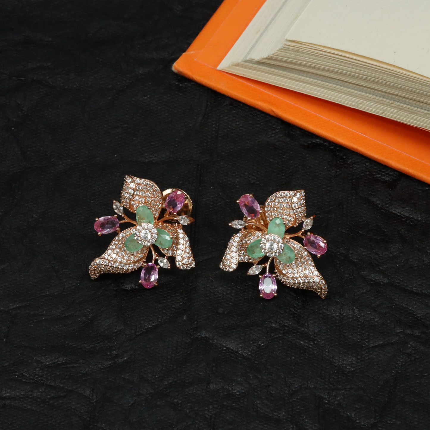 Delicate Botanical Stud with Flowing Leaf Motifs and Floral Centre Structure
