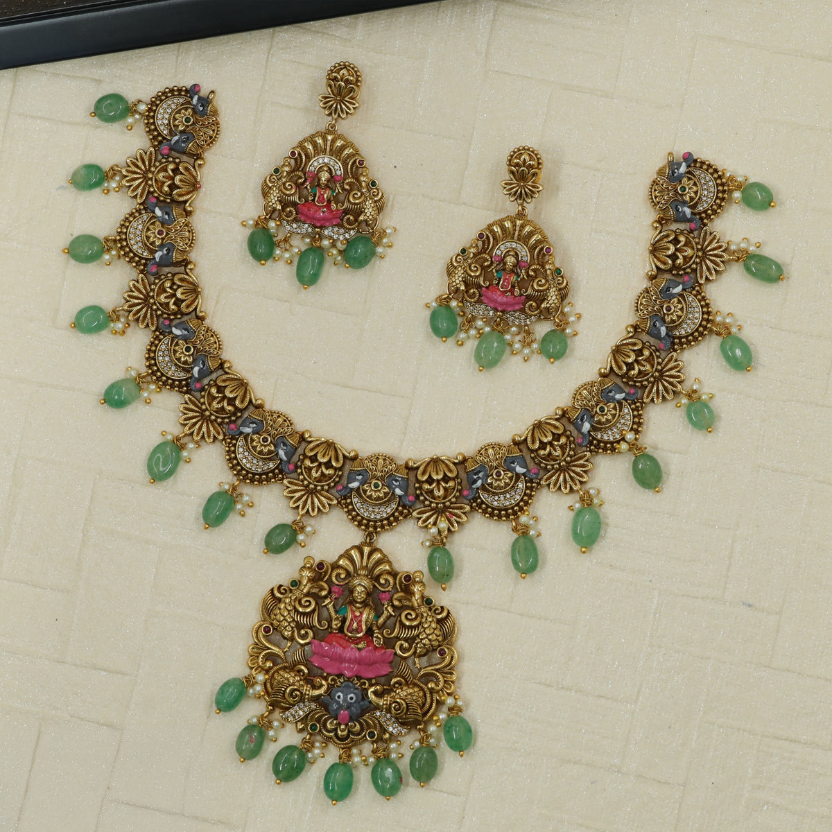 Antique necklace with intricate Lakshmi pendant