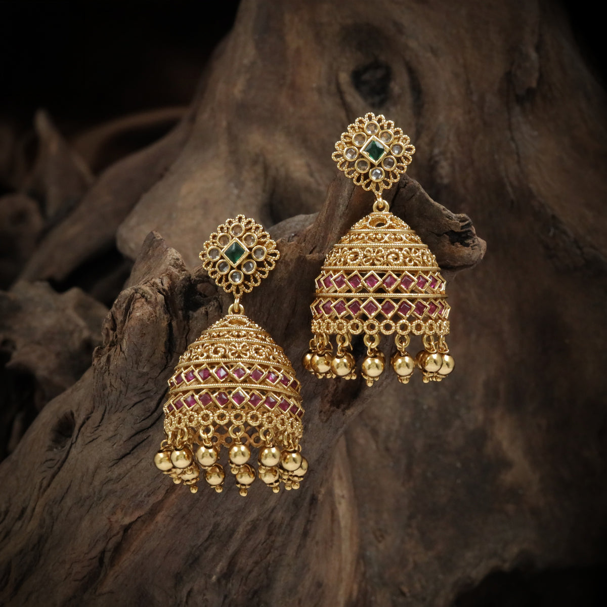 A Refined Antique Jumka with Decorative Studs and Textured Bell Drops