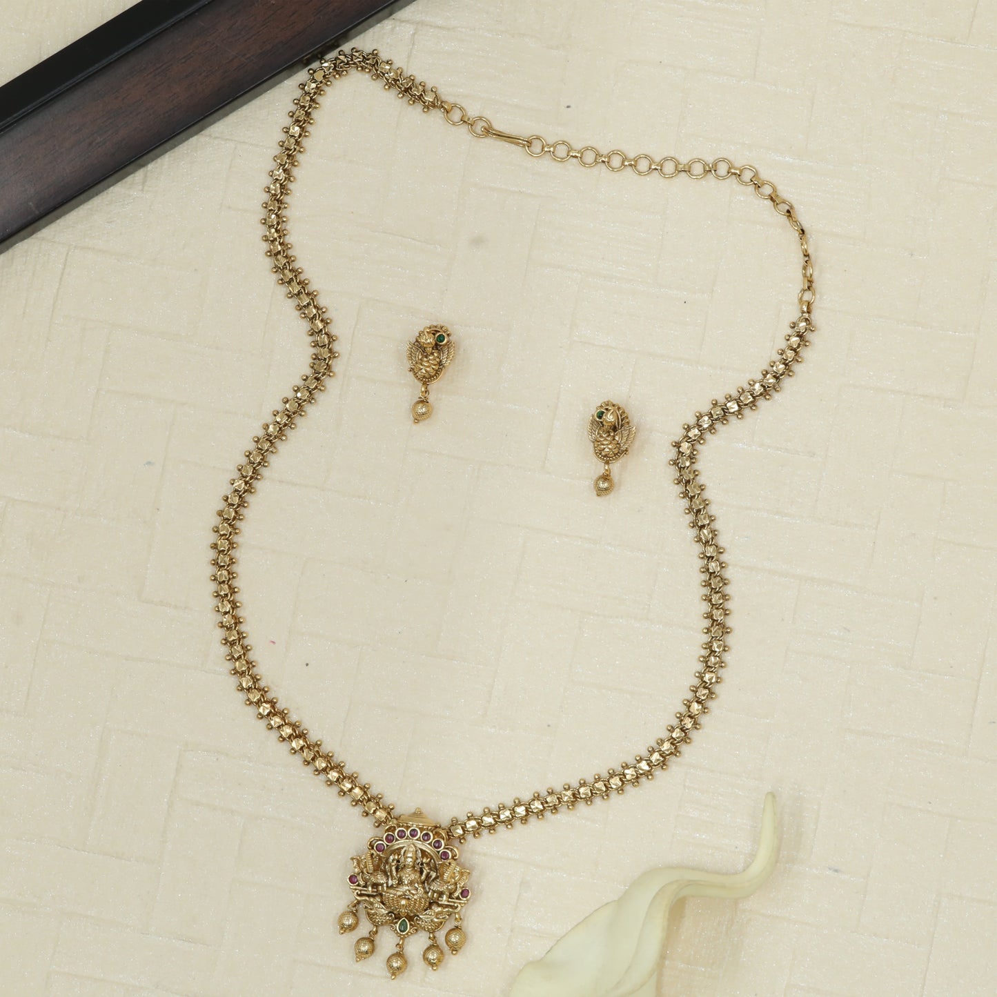 Sacred Motif Chain Necklace with Lakshmi Pendant and Drop Charms