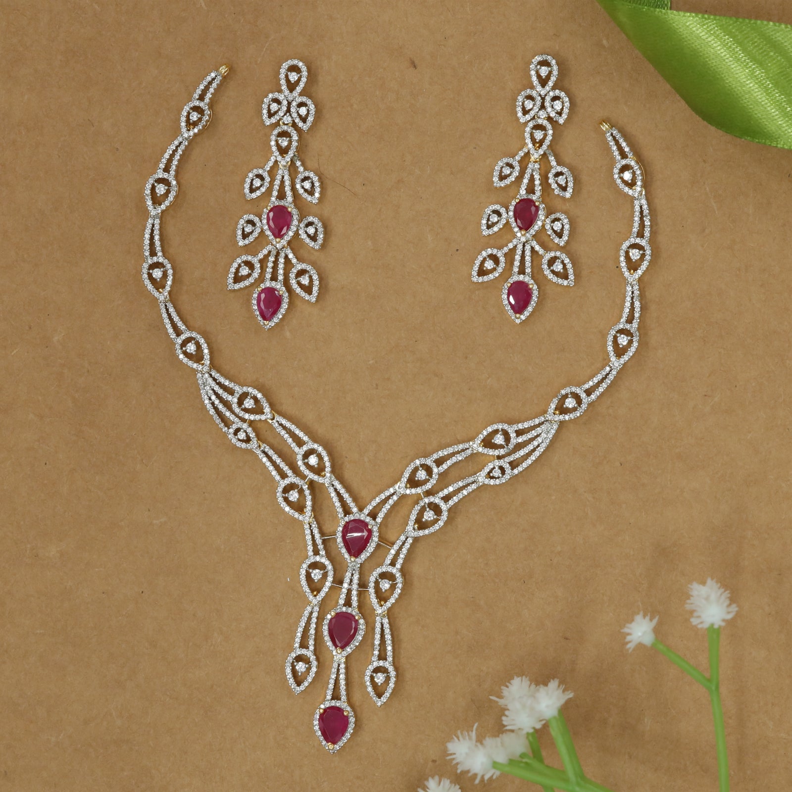 Graceful Leaf Motif Diamond-Style Necklace Set with Flowing Drop Design