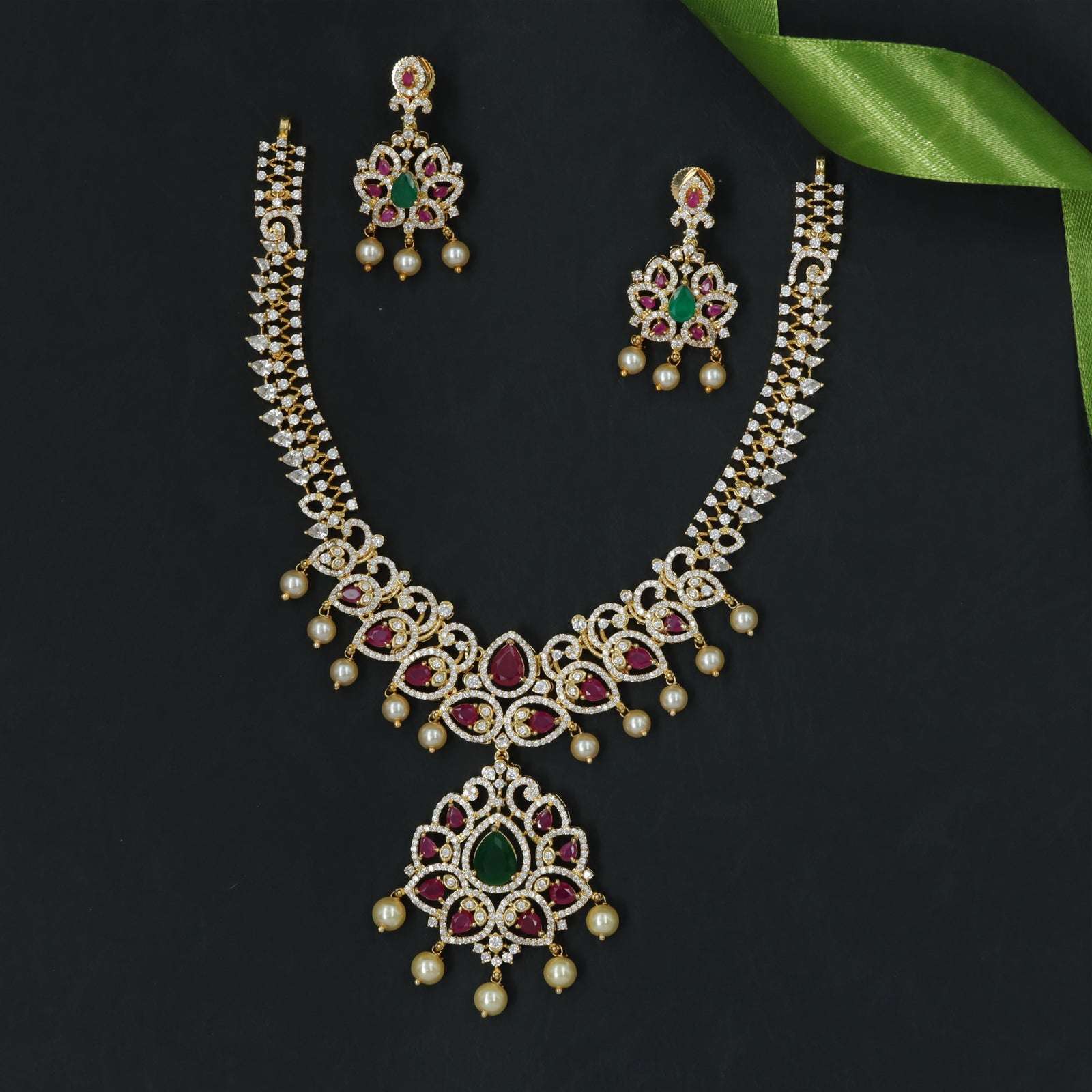 Stone-Rich Necklace with Central Drop Pendant and Fringe Accents