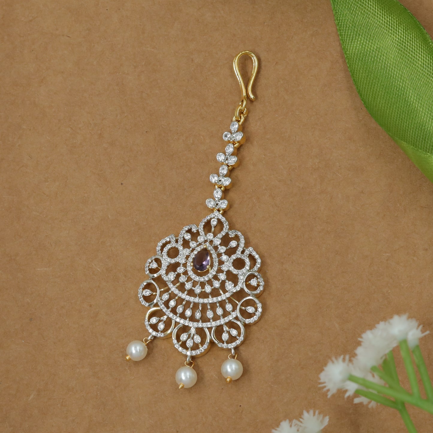 Detailed Lattice Flower Design Tikka with Balanced Pearl Ends