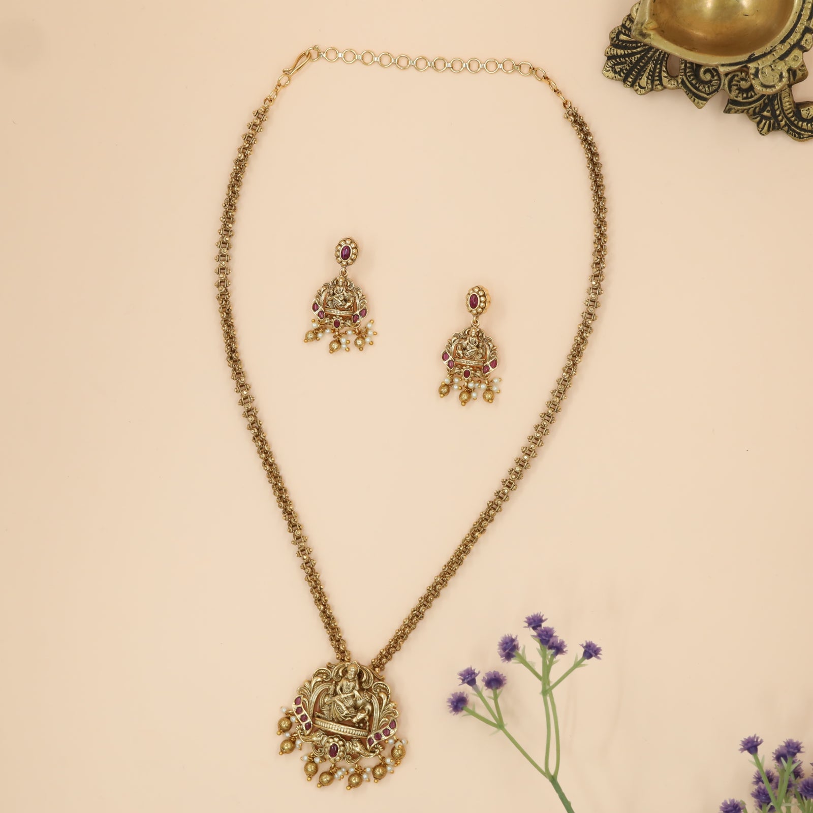 Divine Kamadhenu Lakshmi Chain with Ornate Scroll Frame