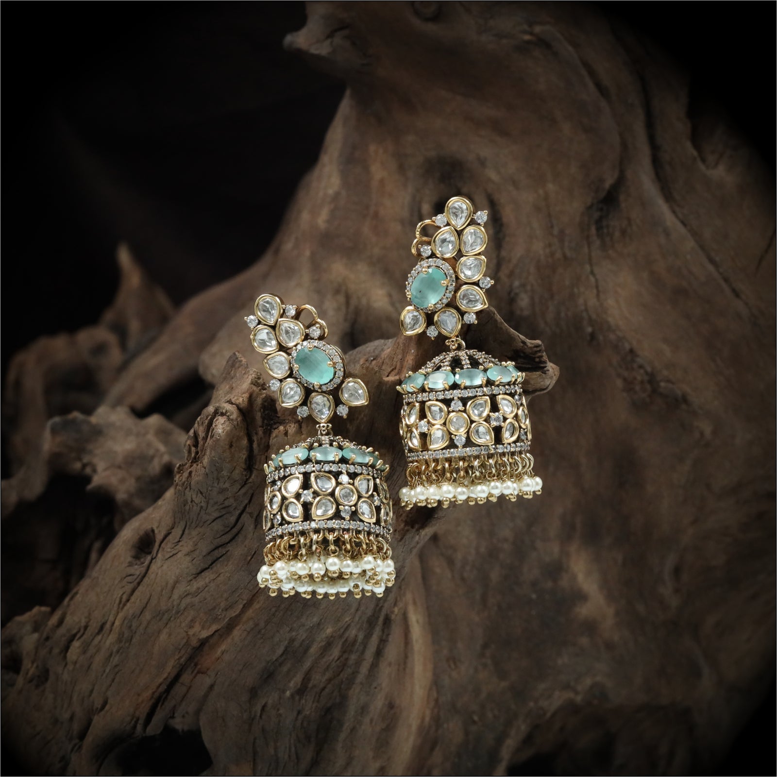 Artisan leaf cluster jumka with structured dome and chain drops