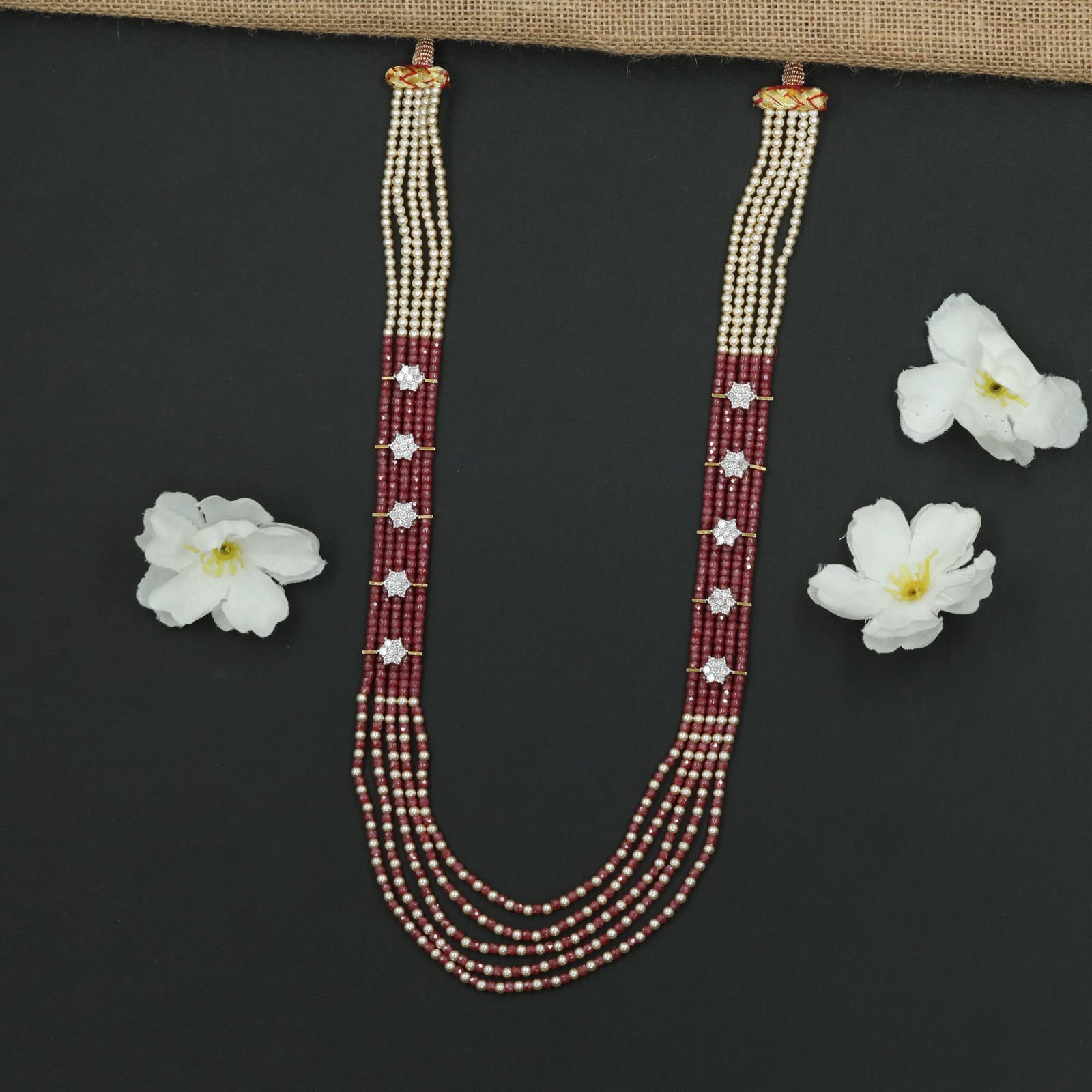 Flowing Crystal Bead Long Haara with Ornamental Flower Link Design