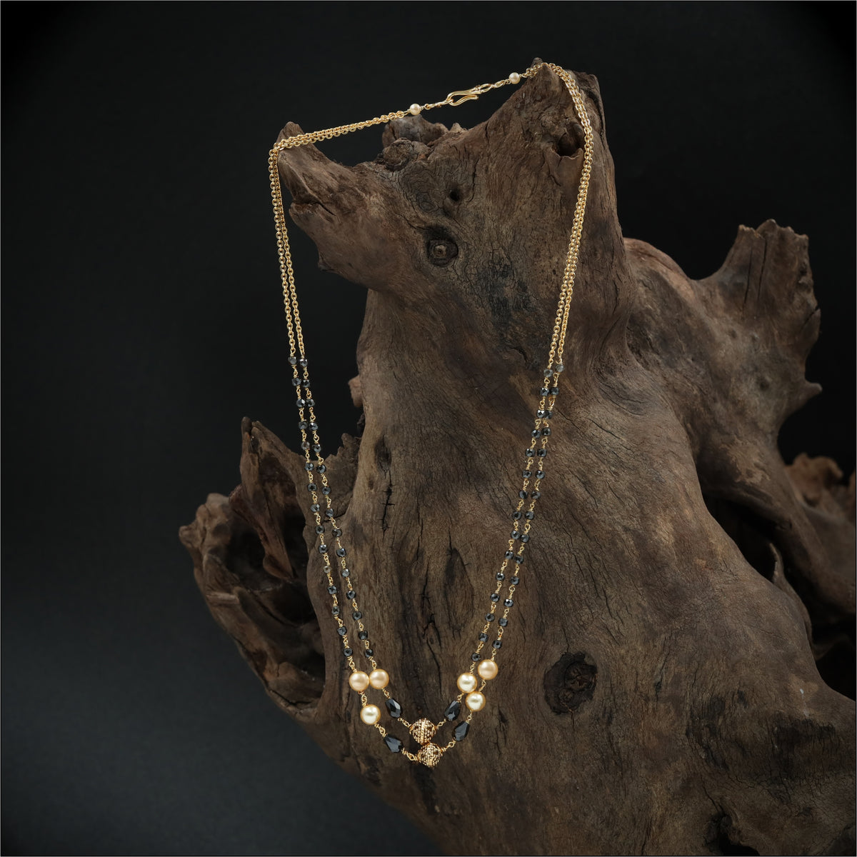 Sleek Dual Strand Beads with Fine Chain and Faceted Accents