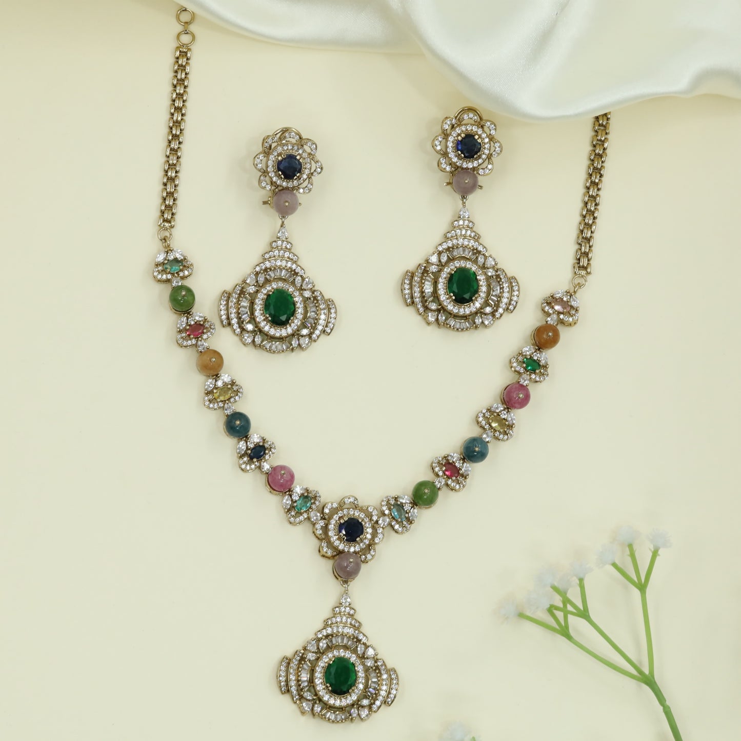 Gilded Bead Necklace with Repeating Floral Connectors and Tiered Pendant