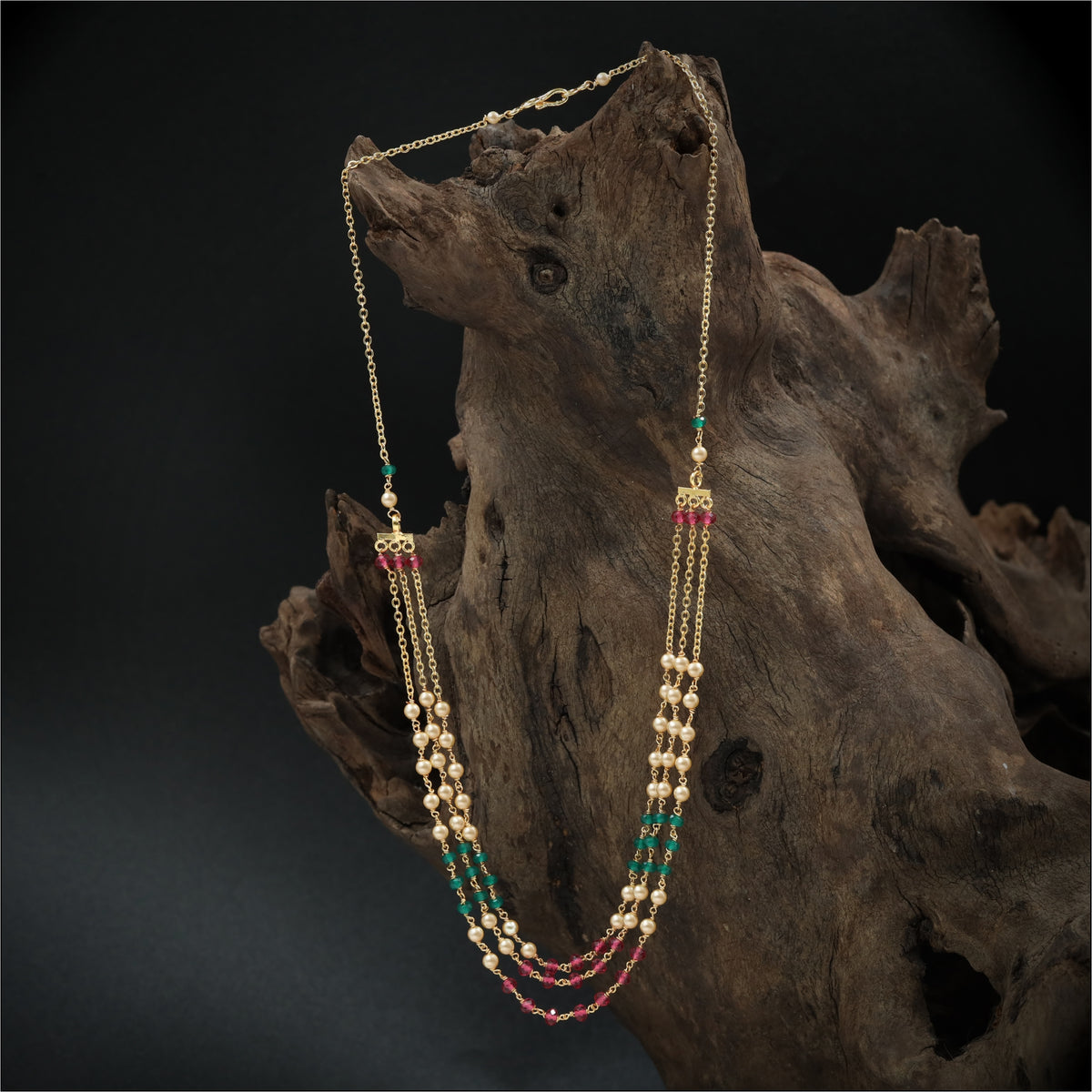 Slender Beads with Symmetrical Drop Formation