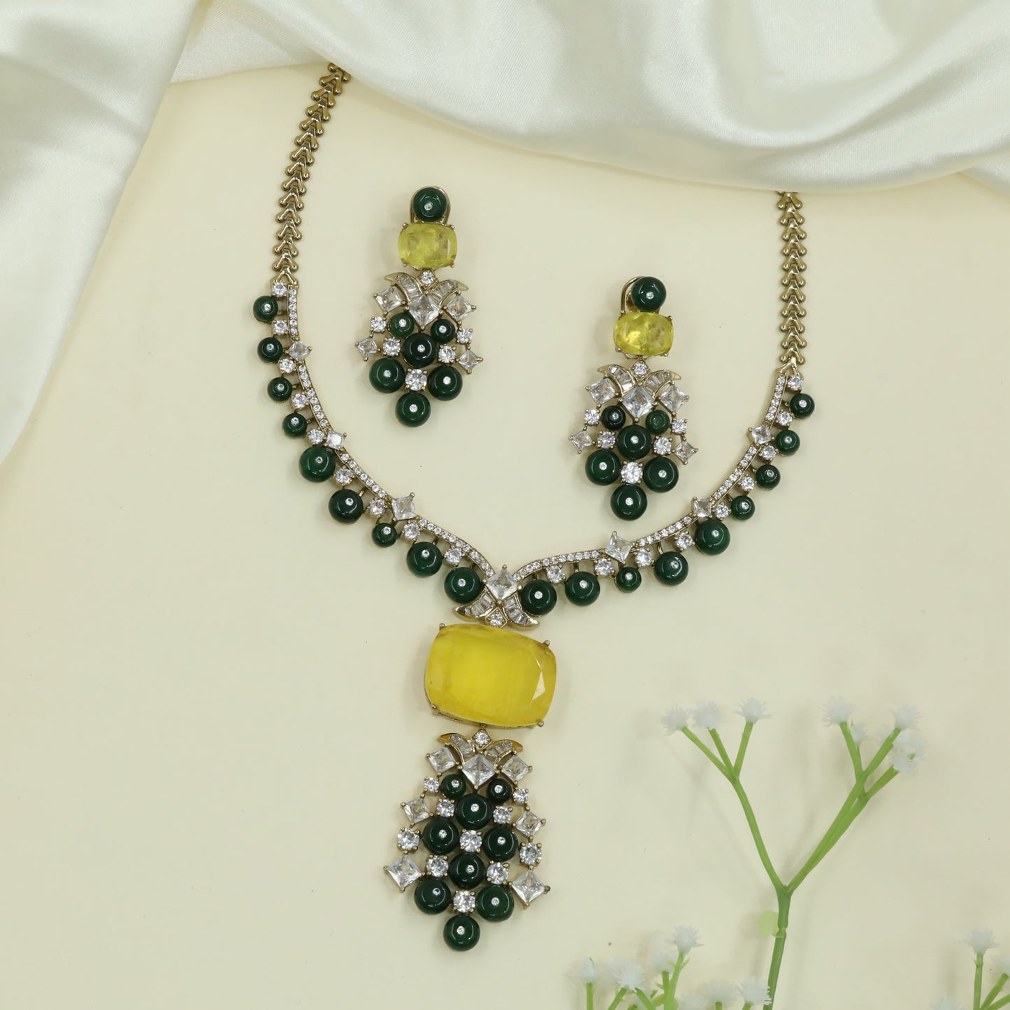 Refined Arc Design Necklace with Repeating Round Drops and Structured Centerpiece