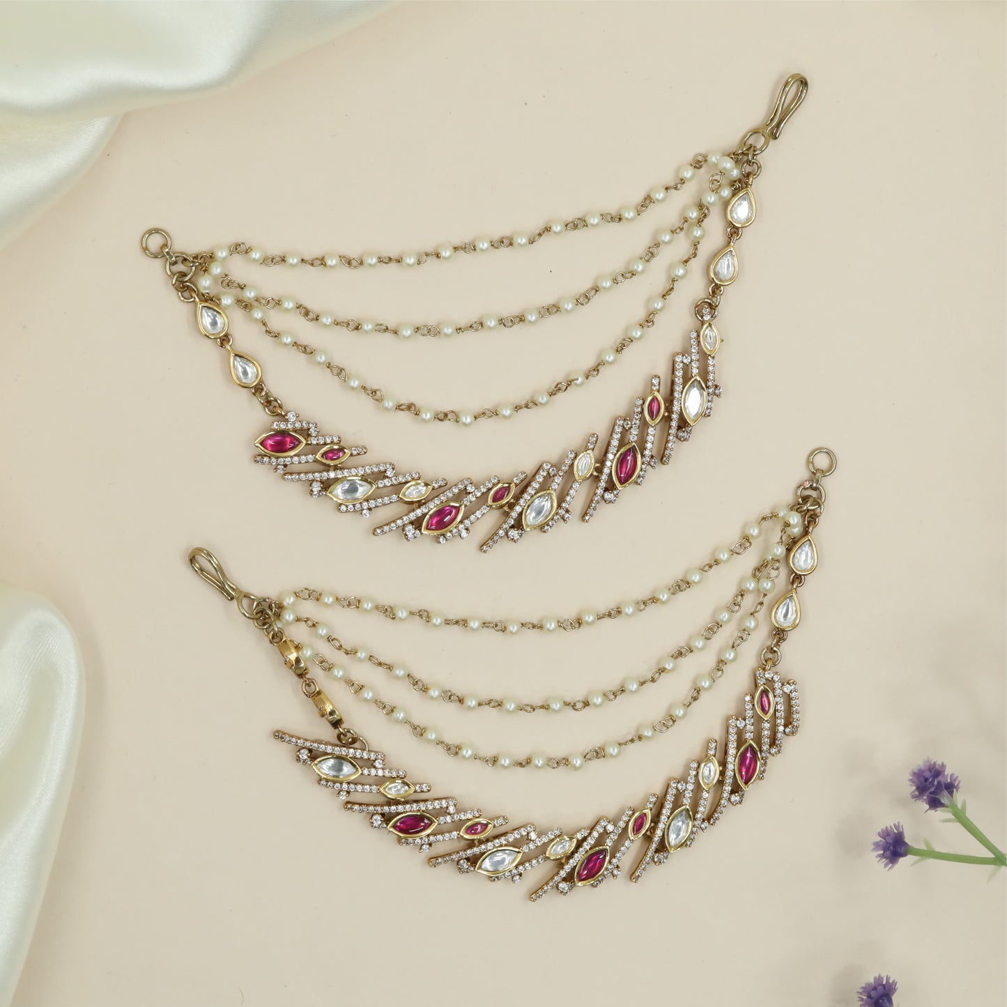 Draped beads mati with triple strands and angled panel hangings with drop detailing