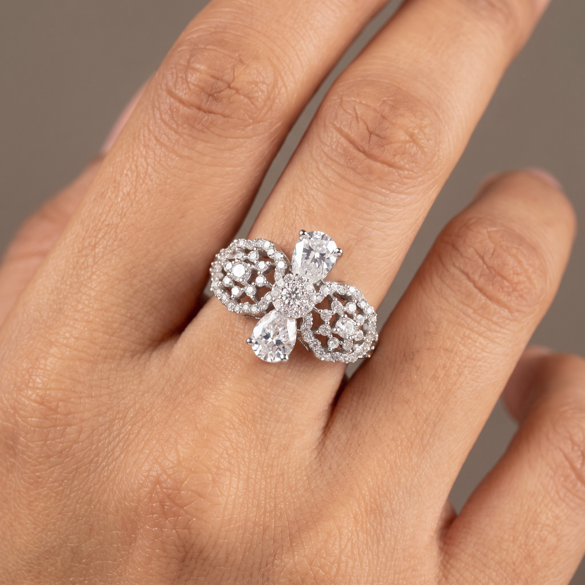 Triple cluster frame finger ring design