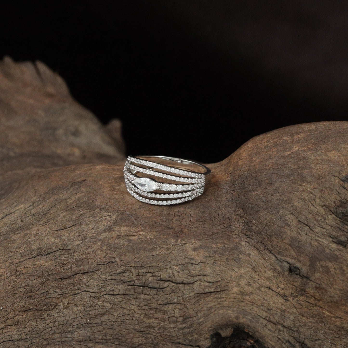 Parallel Curve Finger Ring with Raised Oval Mount