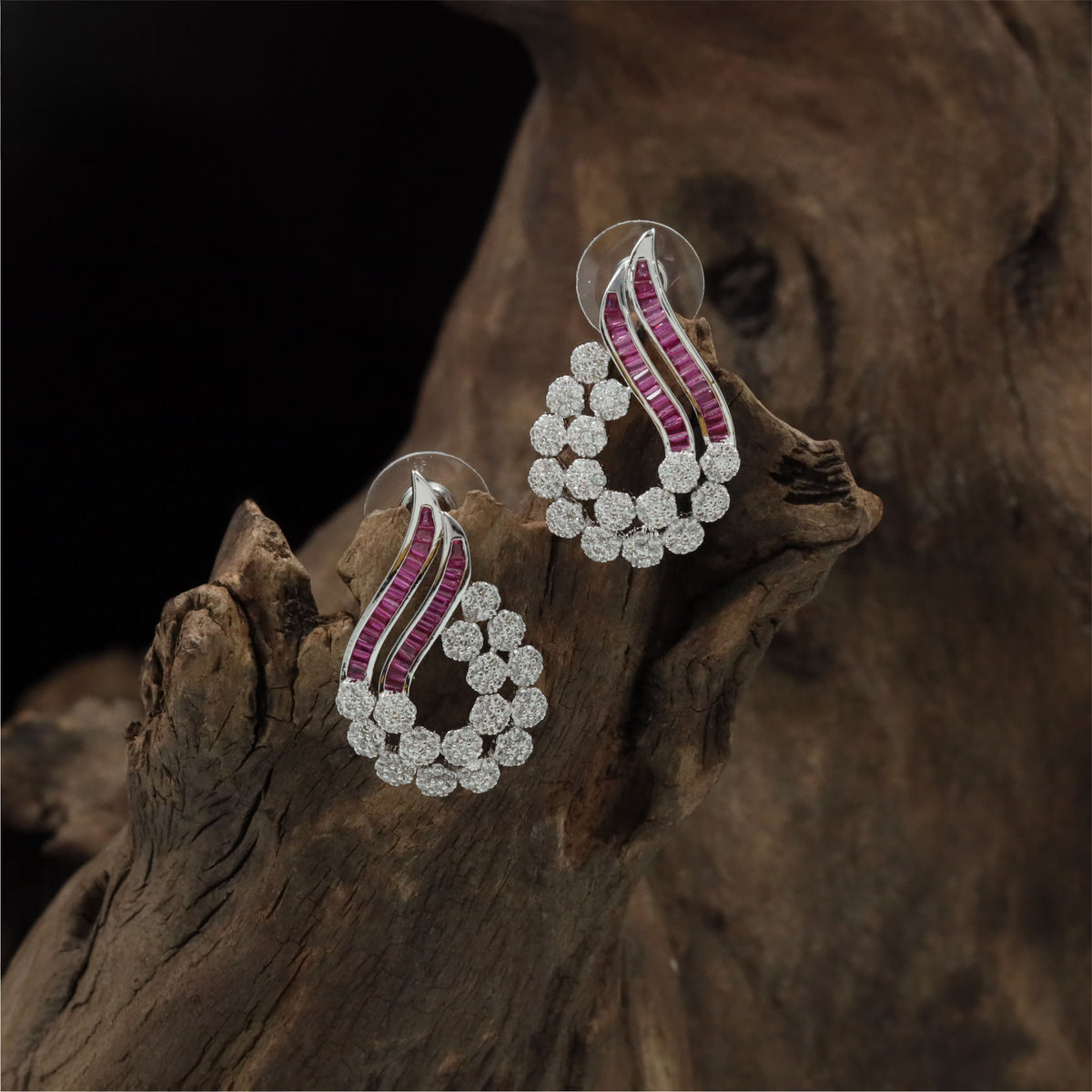 Rhodium Studs Featuring An Ornamental Openwork Form