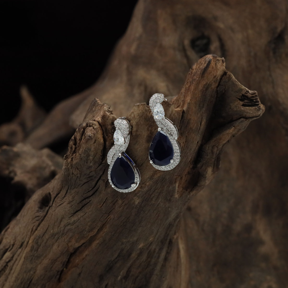 Contemporary Drop Rhodium Studs With Twisted Silhouette