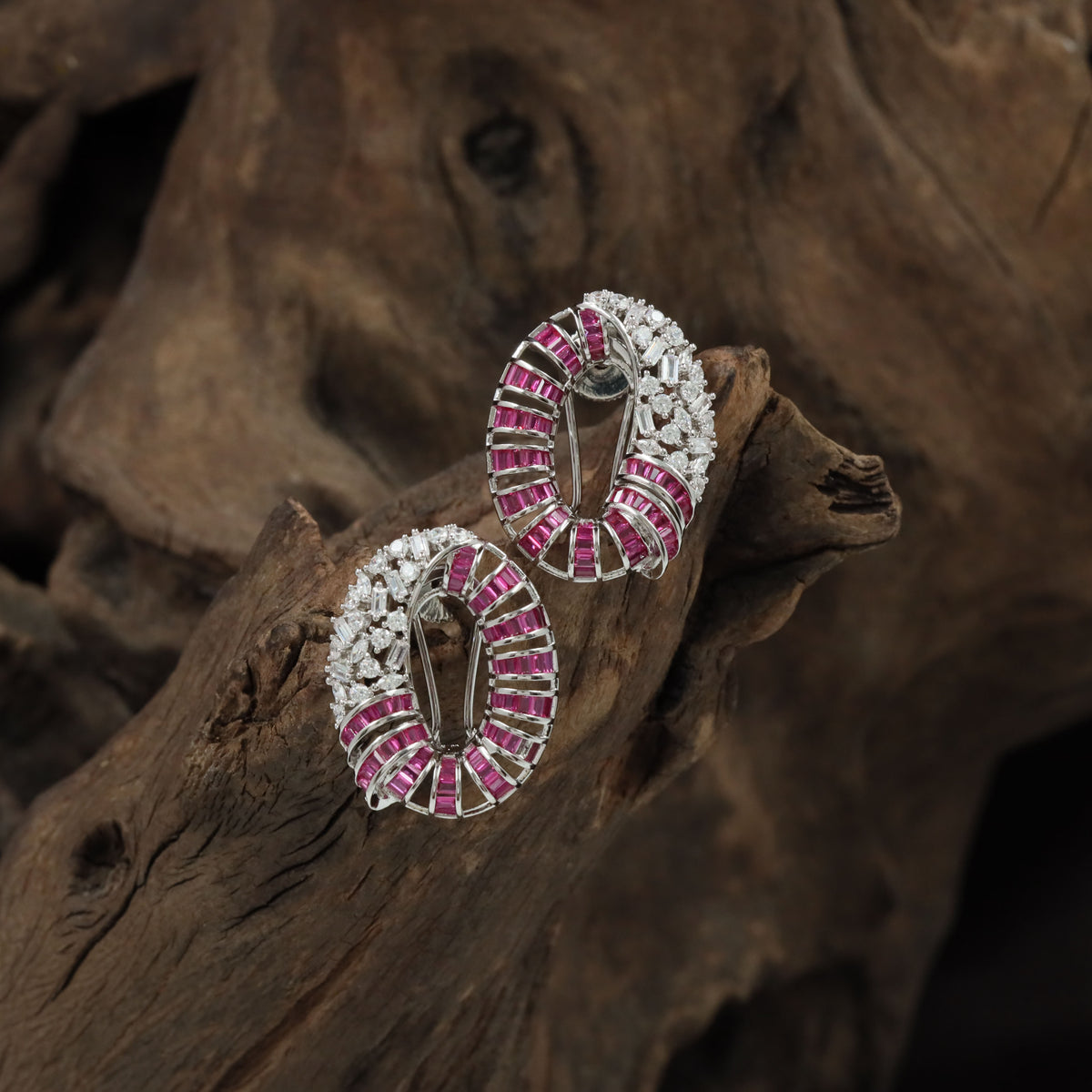 Elegant Rhodium Studs With Curved Geometric Patterns
