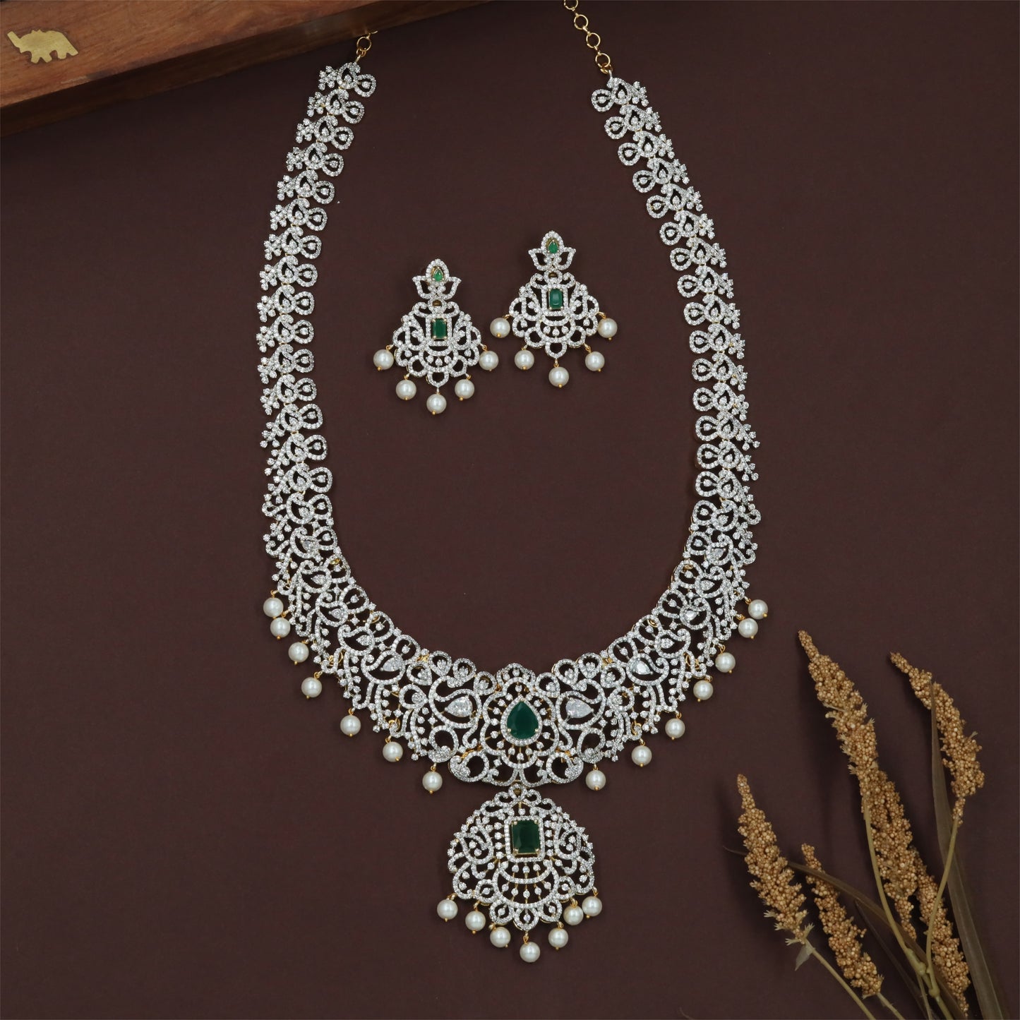 Temple Style Gj Long Haara with Structured Floral Frames and Grand Pendant Work