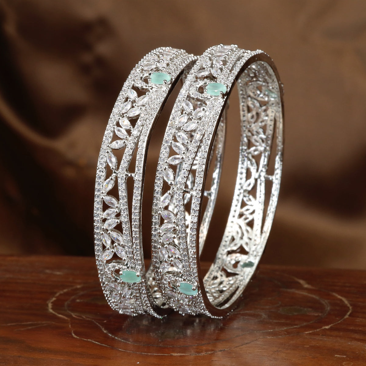 Regal Rhodium Bangles Featuring Intricate Leaf Patterns