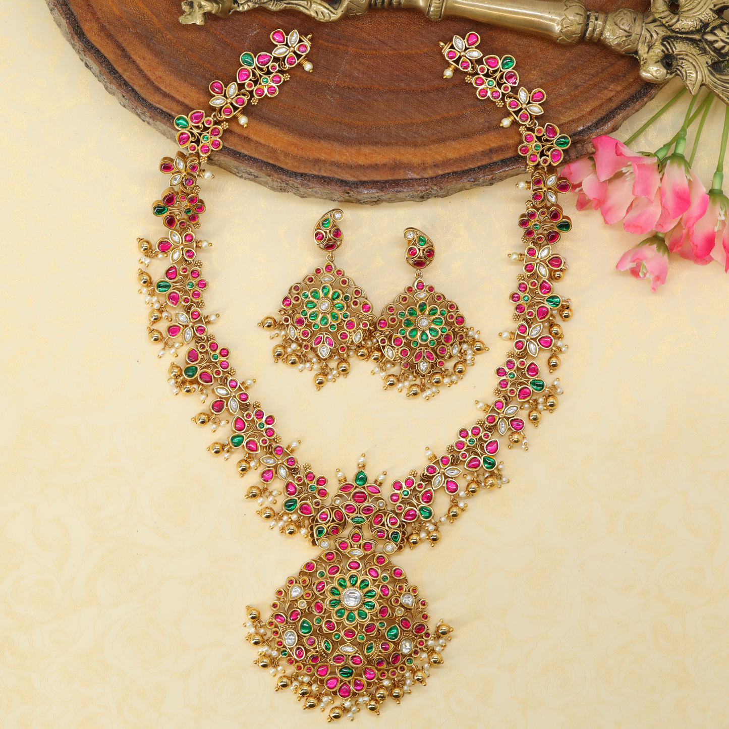 Radiant Floral Pattern Long Haara with Dense Stonework and Grand Circular Pendant