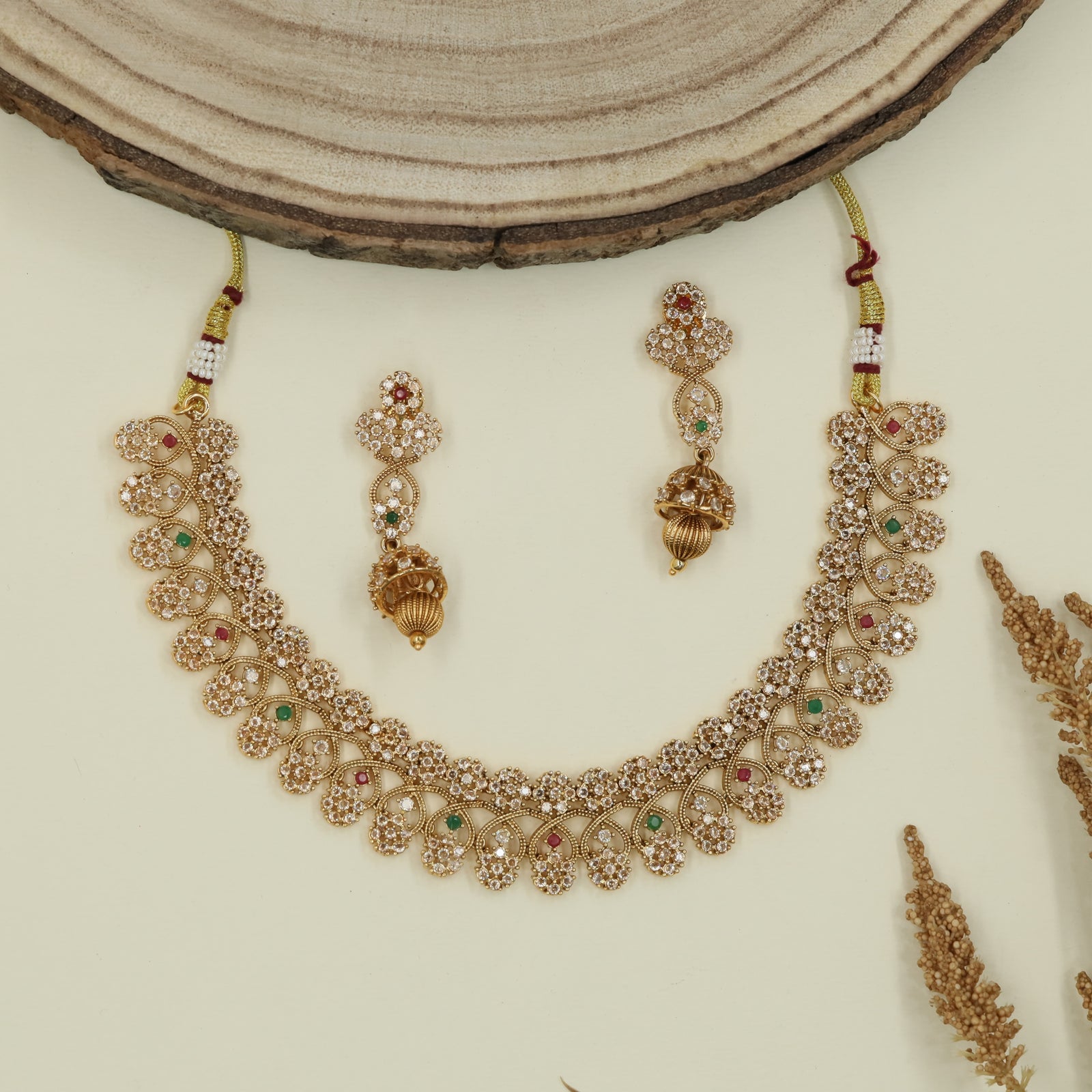 Vine pattern antique necklace with repeating floral clusters and fringe hangings